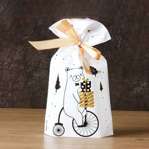 ถุงผ้าริบบิ้นน่ารักพกพาสะดวก สำหรับบรรจุของขวัญคริสต์มาสและปีใหม่  ใส่ขนมอบ บิสกิต หรือของจุกจิก - Product Image 5