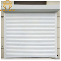 Porte roulante électrique industrielle à isolation thermique coupe-vent pour garage domestique intérieur et extérieur Porte roulante automatique en aluminium