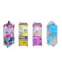 Machine à griffes pour attraper les poupées, fabrication OEM, vente en gros, designs métalliques personnalisés pour les aires de jeux pour enfants, centres commerciaux et salles de jeux