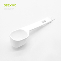Vente directe usine – Cuillère doseuse 25CC de haute qualité avec manche blanc et brosse de nettoyage plate intégrée – Cuillère à lait en poudre pour cuisine