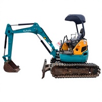 Mini-excavatrice Kubota U30 d'occasion, 3 tonnes, sur chenilles, compacte, pour travaux agricoles et de construction, avec accessoire de préhension.