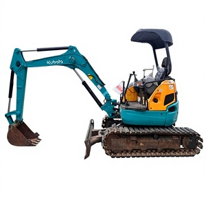 Mini-excavatrice Kubota U30 d'occasion, 3 tonnes, sur chenilles, compacte, pour travaux agricoles et de construction, avec accessoire de préhension. - Product Image 1