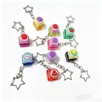 Porte-clés mignon anti-stress avec bouton de clavier, bouton à pression, bouton fruit et bouton lumineux