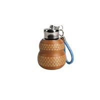 Bouteille d'eau portable en titane pur, isolée, style gourde, avec infuseur à thé, fabriquée à la main, style chinois moderne, idéale pour l'extérieur
