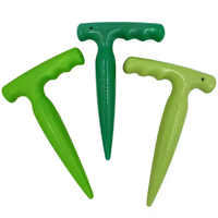 Perforateur de trou en plastique vert repiquage disséminateurs de graines plantation réglable utilisé dans les jardins domestiques