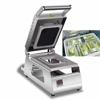 Dames — plateau alimentaire à fermeture manuelle, machine à emballer, cuisine