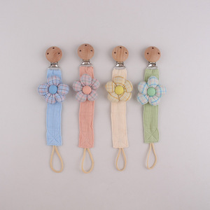 Accessoire bébé transfrontalier original automne/hiver : Jouet en tissu PC à motif floral avec sangle anti-perte et attache-sucette - Product Image 1