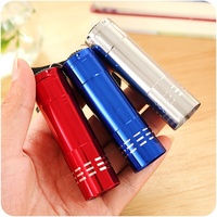 Mini lampe torche tactique portable à 9 LED avec logo personnalisé, corps en aluminium super lumineux, lampe de poche puissante, petite lampe
