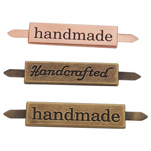 Bolso de mano <span class=keywords><strong>con</strong></span> logotipo metálico grabado personalizado Midea, bolso <span class=keywords><strong>con</strong></span> placa de marca, logotipo metálico, tela de herrajes, logotipo metálico para <span class=keywords><strong>camisetas</strong></span>, bolsos de mano, natación - Product Image 6