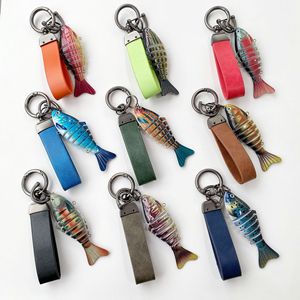 Bionic Fish Lure Keychains Multi Jointed Swimming Pendant <b>Keyring</b> Leather Strap <b>Car</b> Charms Fishing Gifts Wholesale - Product Image 1