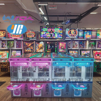Usine en gros grue griffe Arcade Machine Mini peluche jouet monnayeur enfants impression numérique pas cher bonbons cadeau grue Amusement