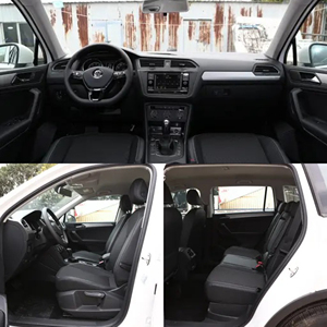 Voiture d'occasion 2020 pour <span class=keywords><strong>Tiguan</strong></span> L Turbo 4x4 Automatique 7 places Gauche Toit ouvrant panoramique foncé Faible kilométrage Sans accident SUV Cuir - Product Image 3