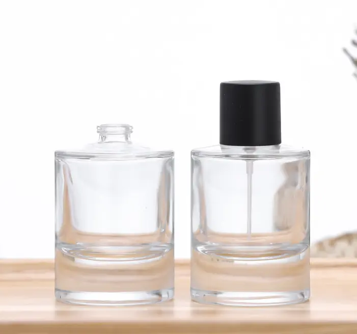 Wholesale Custom50ml 100ml round transparent perfume glass bottle perfume bottle