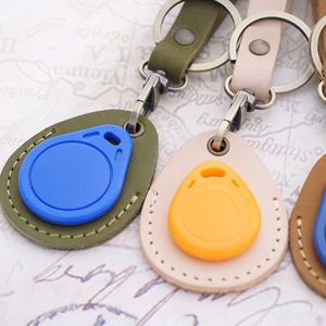 Genuine Leather Round Embossed <b>Key</b> Fob Holder Access Card Holder <b>Key</b> <b>Chains</b> NFC Smart Tag <b>Key</b> Fob Protector - Product Image 3