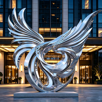 Sculpture de phénix en acier inoxydable poli miroir sur mesure, statue métallique de grande taille fabriquée par un fabricant réputé pour l'aménagement paysager extérieur