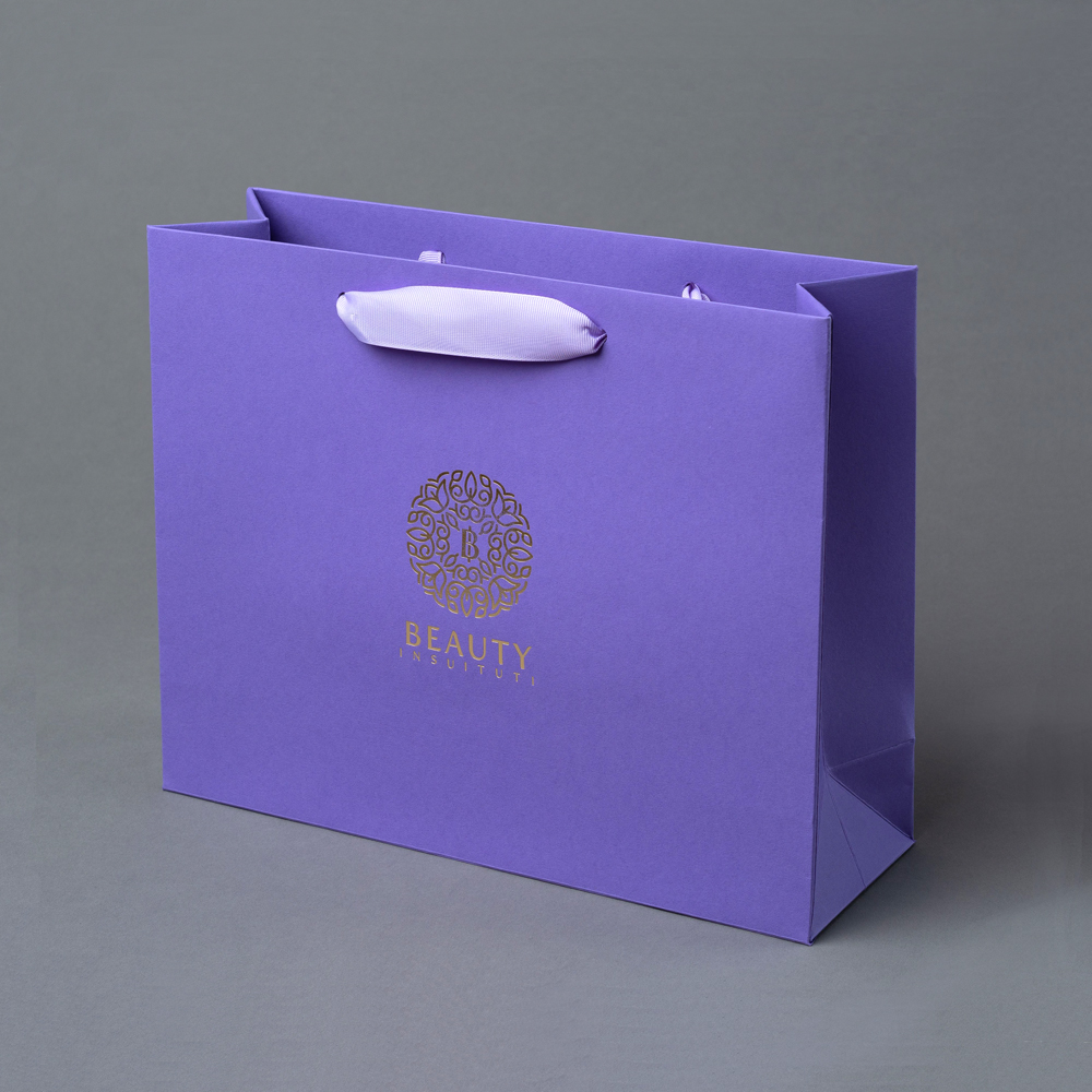 purple paper gift bolsas