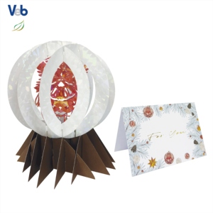 Tarjeta de Navidad Plegable 3D con Diseño de Esferas y Lámina Láser Transparente, Personalizada, Ecológica y Hecha a Mano - Product Image 1