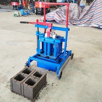 Machine manuelle mobile de fabrication de briques en ciment emboîtables 220V/380V, facile à utiliser