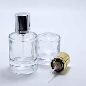 Vente en gros de flacons de parfum ronds en verre transparent de 30 ml, 50 ml et 100 ml avec bouchon argenté - Product Image 4