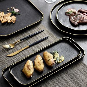 Precio de fábrica, venta al por mayor, plato plano para servir con borde dorado de gres, platos negros de cerámica mate, plato de cena para cafetería, restaurante - Product Image 4