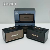 Nouveau haut-parleur portable d'extérieur en bois XM301 Retro 5.0 avec subwoofer 10W, radio FM intégrée et batterie, design compact