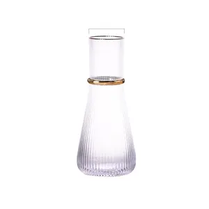 Venta caliente Botella de agua de vidrio sin plomo de cristal transparente de oro creativo de gran capacidad para el hogar
