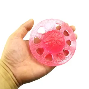 Nuevas llegadas Productos de venta al por mayor Colores personalizados Agujeros de mano Disco Bola de masaje de descompresión Juguetes para niños