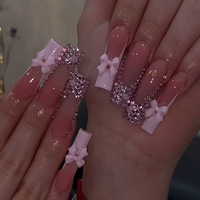Ongles à presser roses super scintillants, style français européen, avec nœud 3D et strass, extra longs, forme cercueil, très tendance