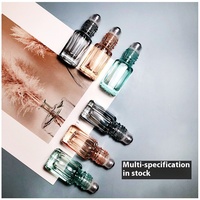 Vente en gros de rouleaux octogonaux de 3 ml/6 ml/10 ml pour flacons, flacons en verre colorés pour parfum/huile/sérum, remplissage séparé, scellage par roulement, sérigraphie