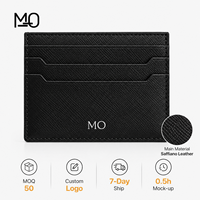 Porte-cartes en cuir noir minimaliste et fin avec texture croisée et fentes horizontales pour projets de cadeaux d'entreprise