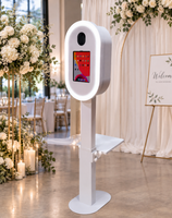 Photomaton ovale moderne réglable en hauteur compatible avec les appareils photo reflex et les iPad, avec support d'imprimante