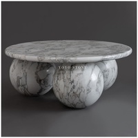 Table basse de luxe en marbre blanc Calacatta avec base sphérique, centre de table moderne et rond pour salon au design artistique