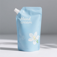 Sac d'emballage par extrusion de pâte bleu clair imprimé personnalisé sac de pochette à bec pour crème pour les mains savon liquide sac d'emballage en plastique