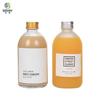 Bouteilles de boissons en verre rondes transparentes et givrées sur mesure de 150 ml, 280 ml, 350 ml, 500 ml pour jus et kombucha avec bouchons à vis