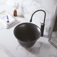 Vasque de salle de bain ronde moderne et minimaliste à poser, en porcelaine artistique, pour salles de bain contemporaines
