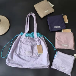 Bolso cruzado de lona para mujer a la moda, bolso con cordón de gran capacidad, bolso de compras plegable ligero con diseño de cordón - Product Image 1