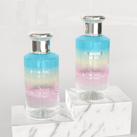 Flacon de parfum en verre vide de 100 ml de qualité supérieure, couleur dégradée personnalisée, fond épais avec base volcanique pour l'emballage de parfums