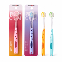 Brosse à dents pour adultes en nylon à poils moyens, personnalisable en gros, avec manche antidérapant pour un nettoyage en profondeur à domicile