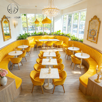 Französischer Holzrahmen Gelbes Samt-Sofa Gepolstertes Stuhl-Set Marmortisch für Café Hotel Restaurant Gewerbe