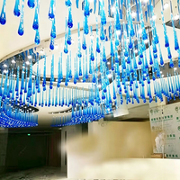 Lustre moderne suspendu en cristal en forme de goutte d'eau avec éclairage LED pour hall d'hôtel, villa, duplex, salon et escalier