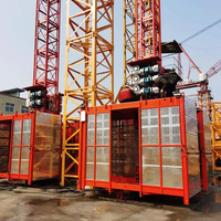 Élévateur à double cage SC200/200 pour la construction, fonctionnement à 2 mains, moteur 11-15 kW, tension 220 V/380 V, capacité 2000 kg, haute performance