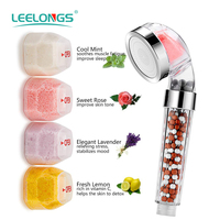 Pommeau de Douche Ionique Filtrant en ABS avec Interrupteur Pause à Touche Unique et Pierres Minérales Rouges pour une Eau Parfumée