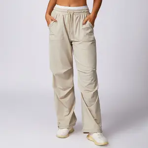 Pantalon de protection solaire respirant pantalon à jambes larges poche pour femme Stretch ample taille haute pantalon de survêtement à jambe droite à séchage rapide