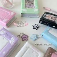 Album de rangement pour photocards Kpop en gros, couverture rigide, motif ailes d'ange en relief, breloque étoile, chaîne de perles, fentes transparentes, cadeau Kawaii pour fans, OEM