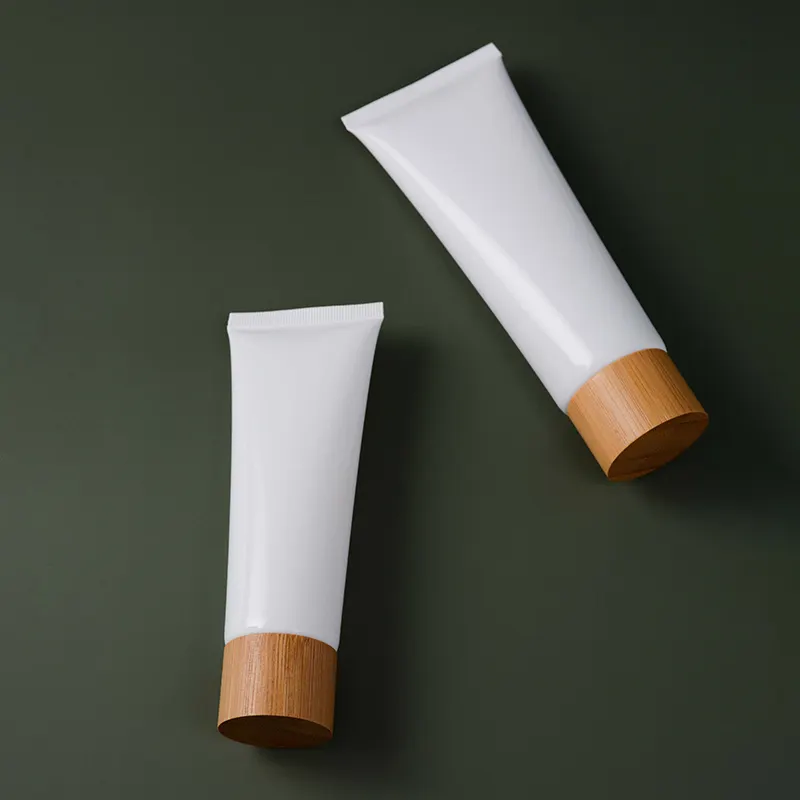 Tubo personalizado biodegradable ecológico, champú, crema de manos, tubo de loción, tapa de bambú, tubo cosmético suave para apretar