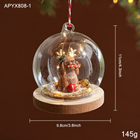 Boule de Noël en verre lumineuse, boule de Noël en verre transparente suspendue avec figurines de chiot et d'ours à l'intérieur