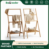 Porte-vêtements moderne en bambou, support de rangement sur pied avec base surélevée pour chambre à coucher