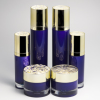 Ensemble d'emballages acryliques bleus ronds droits de 30g 50g 50ml 120ml Bouteille pompe à lotion essence avec couvercle en forme de diamant