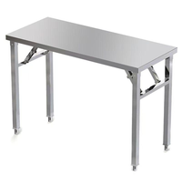 Table de travail en acier inoxydable à structure robuste et stable avec pieds renforcés