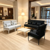 Fauteuil d'appoint moderne mi-siècle en métal torsadé blanc mat avec rembourrage en tissu gris clair, fauteuil lounge individuel pour appartement et centre commercial